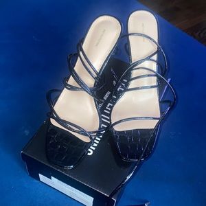 Black lace up patent leather heels